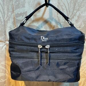 Dior beauty bag. Black nylon with silver hardware.   5-C1A